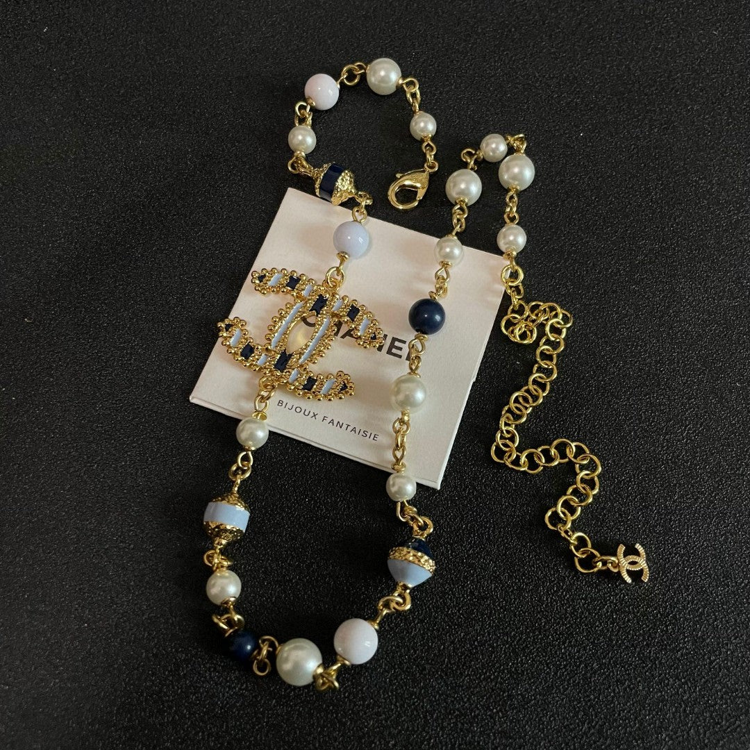 Double-C Emblem Pearl-Detail Pendant Necklace – Pearl Detail – Design 088 close-up detail