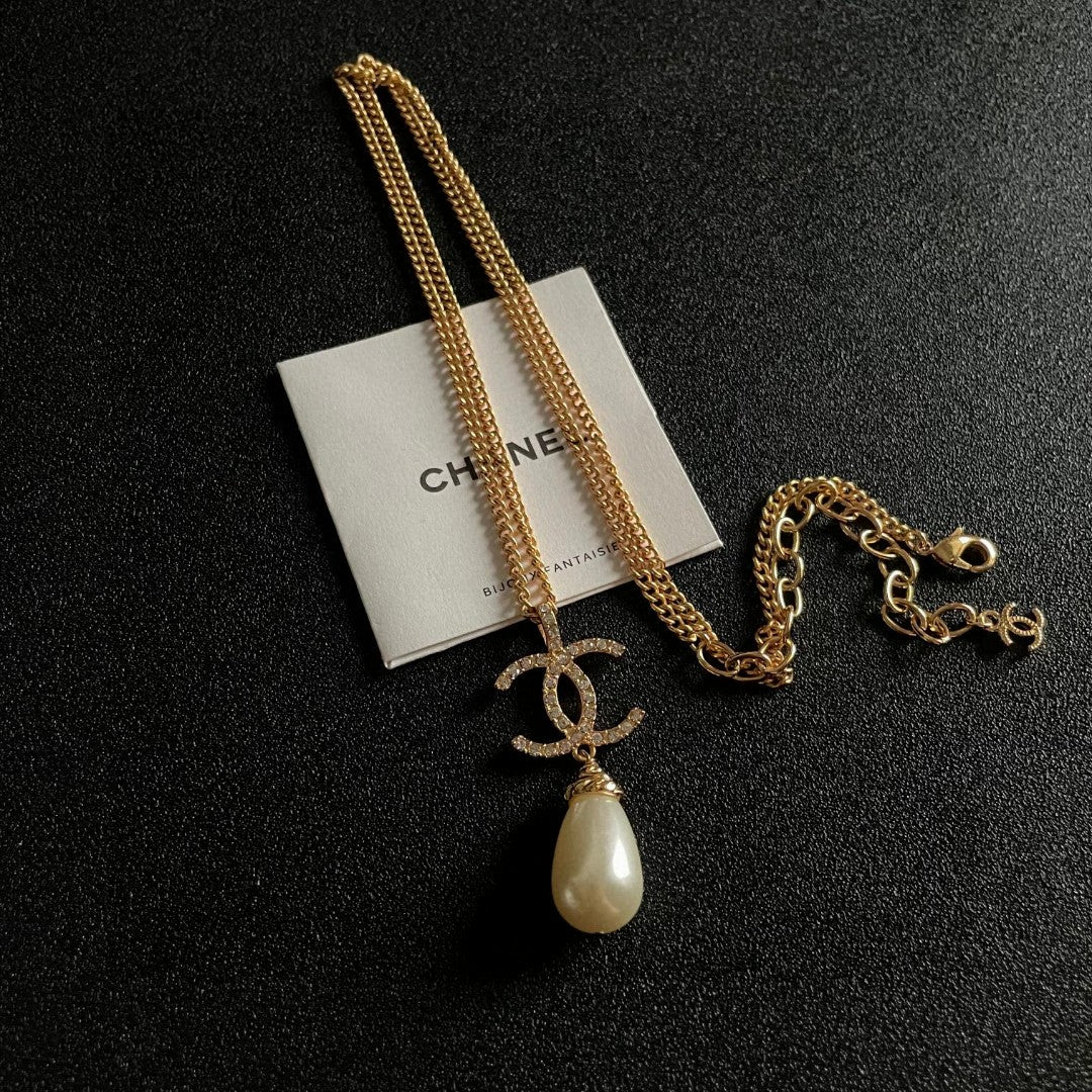 Double-C Emblem Pearl-Detail Pendant Necklace – Pearl Detail – Design 129 detail view