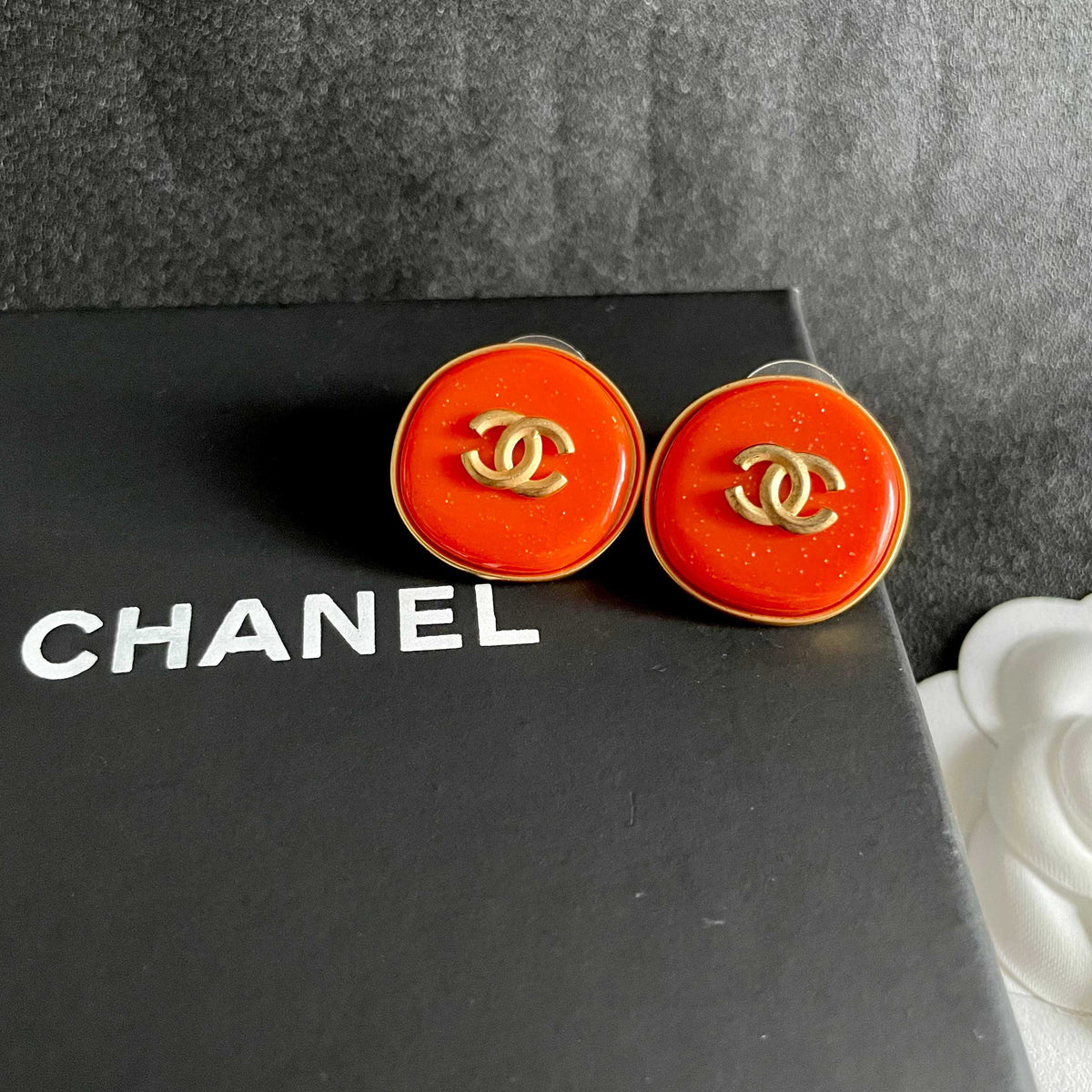 Double-C Emblem Stud Earrings in Polished Metal-Tone – Design 305 detail view