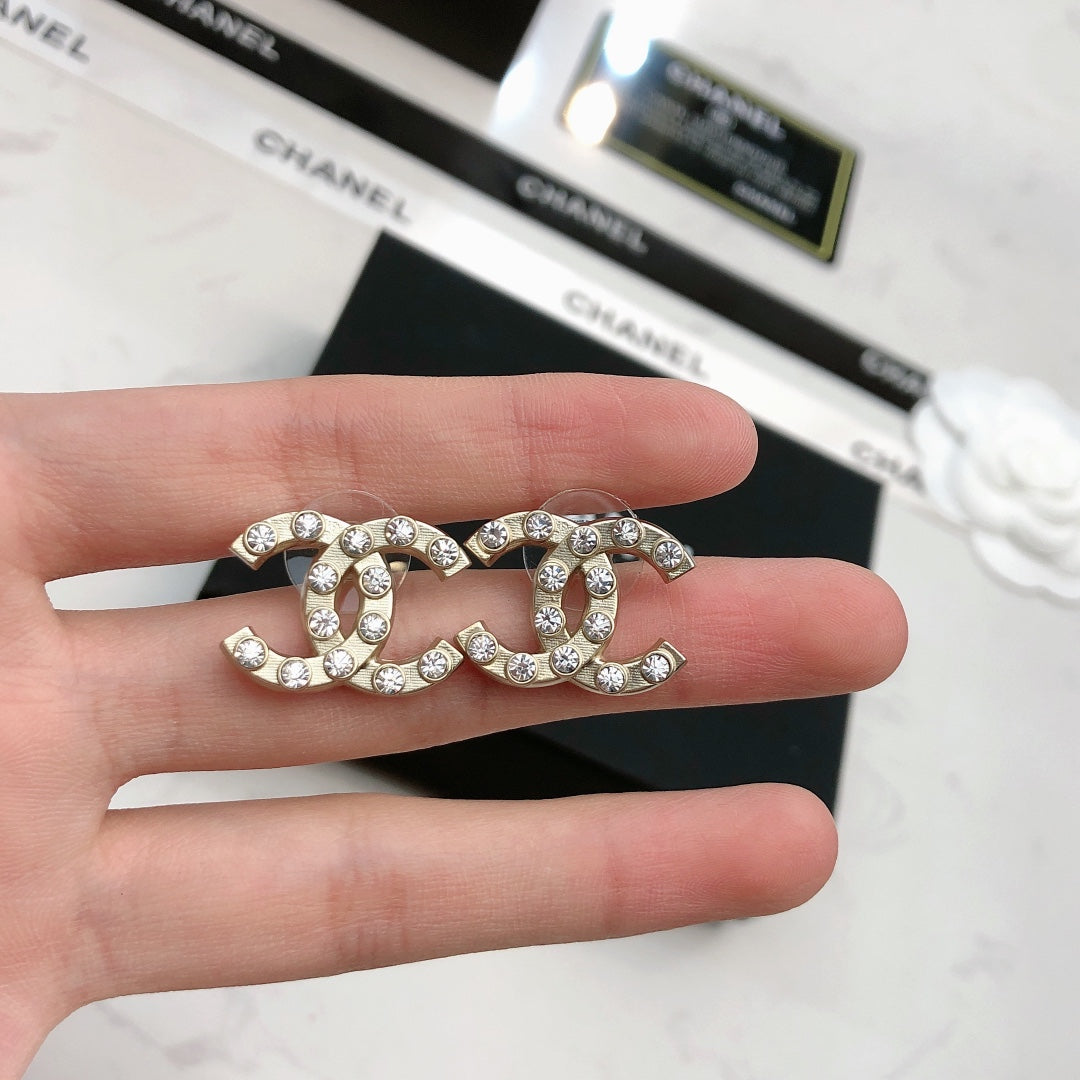 Heart Stud Earrings in Polished Metal-Tone – Heart Detail – Design 003 styled product view