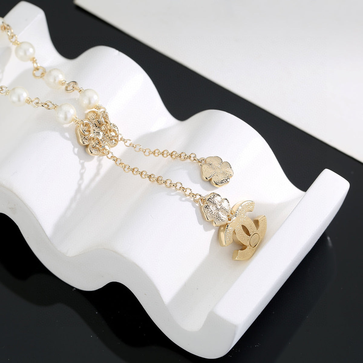 Double-C Emblem Pearl-Detail Pendant Necklace – Pearl Detail – Design 057 styled product view