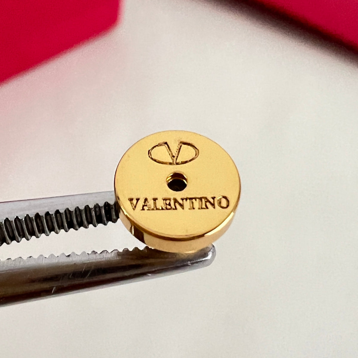 Signature Emblem Stud Earrings in Polished Metal-Tone – Design 07 styled detail