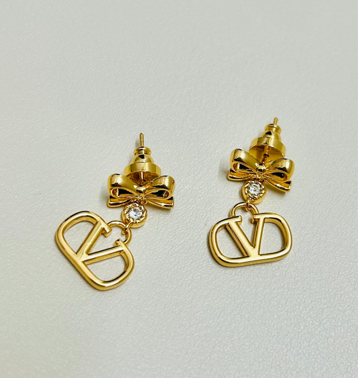 Signature Emblem Stud Earrings in Gold-Tone – Design 16 close-up view