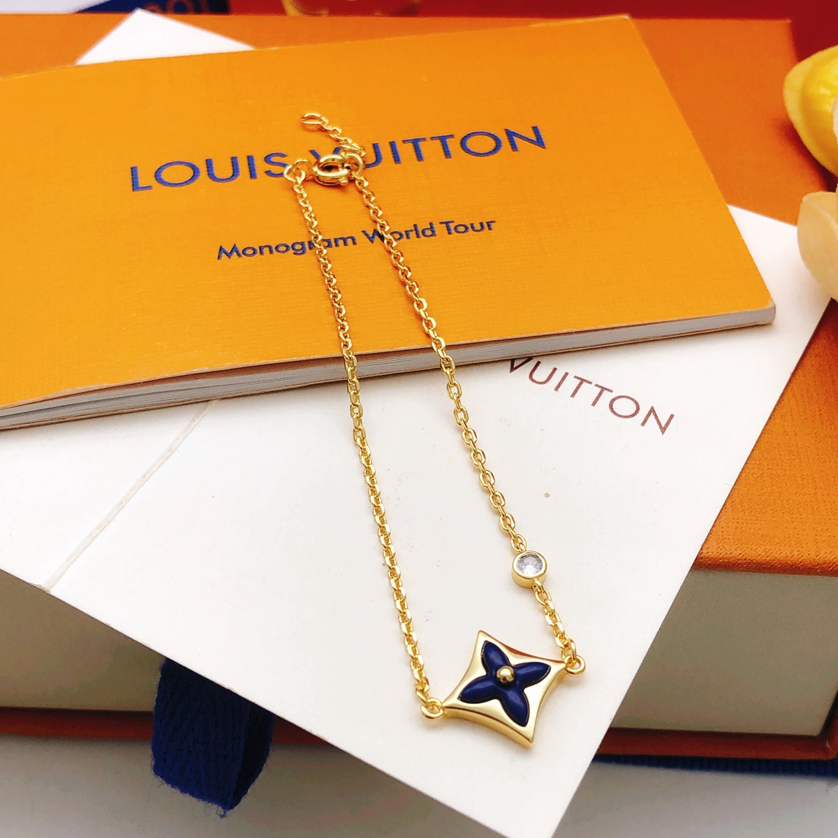 Geometric Emblem Bracelet in Gold-Tone – Blue Detail side detail
