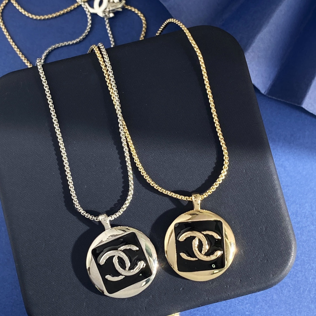Double-C Emblem Pendant Necklace in Gold-Tone – Black Detail – Design 002 detail view