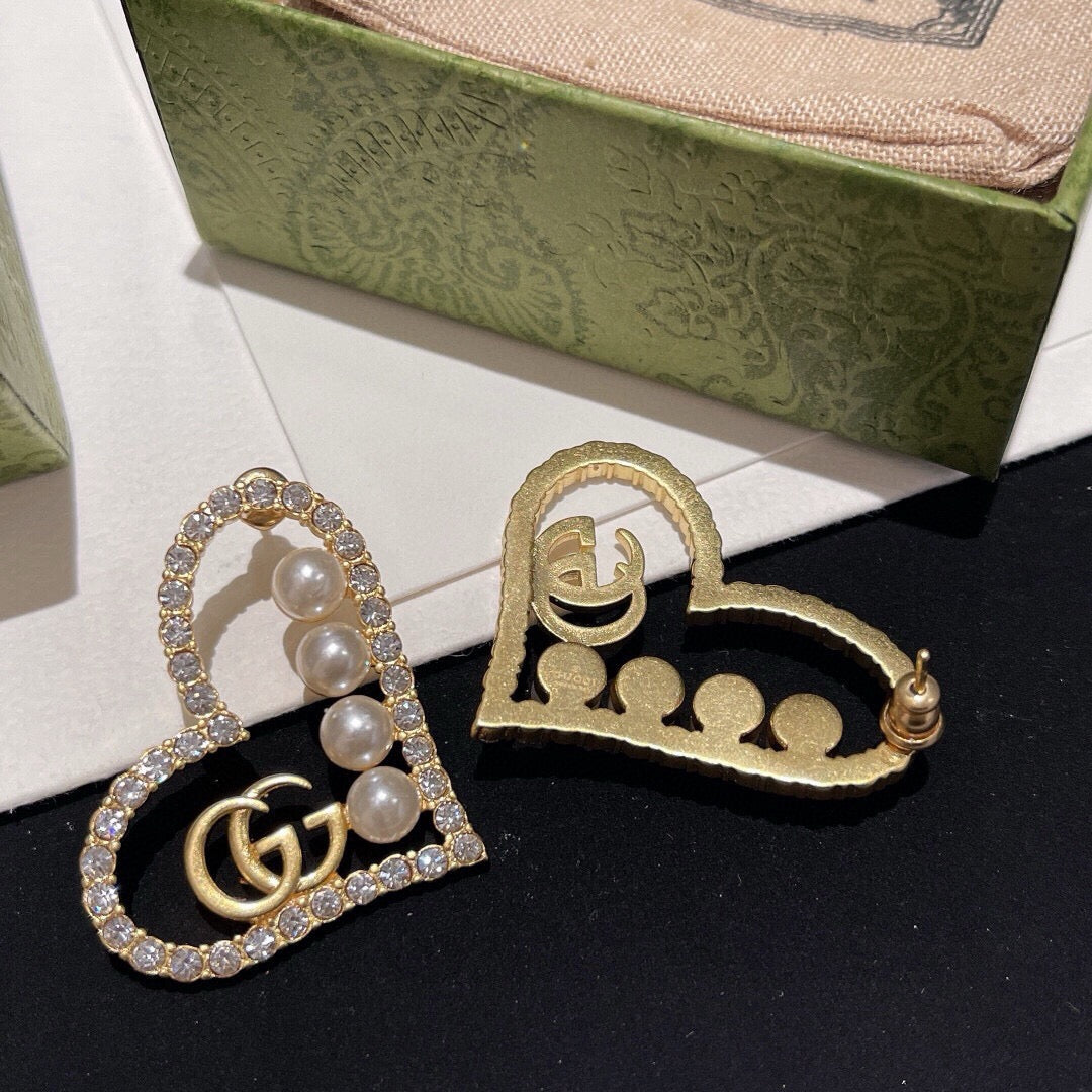 Double-G Emblem Stud Earrings in Polished Metal-Tone – Design 020 styled product view