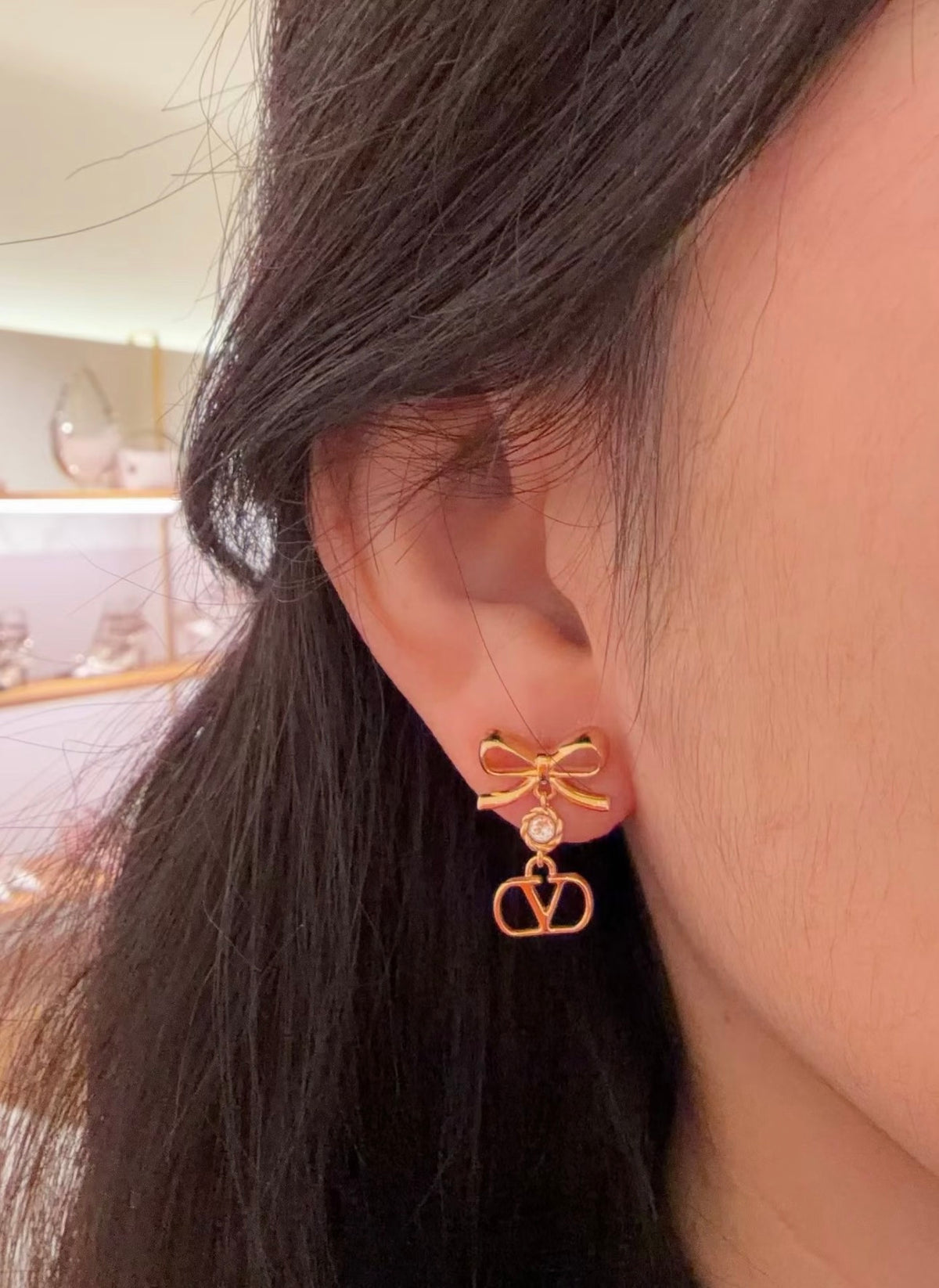 Bow Statement Earrings in Gold-Tone detail view