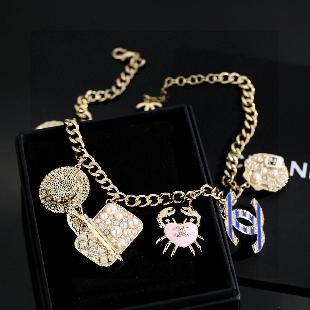 Double-C Emblem Pendant Necklace in Gold-Tone – Shell Detail front product view
