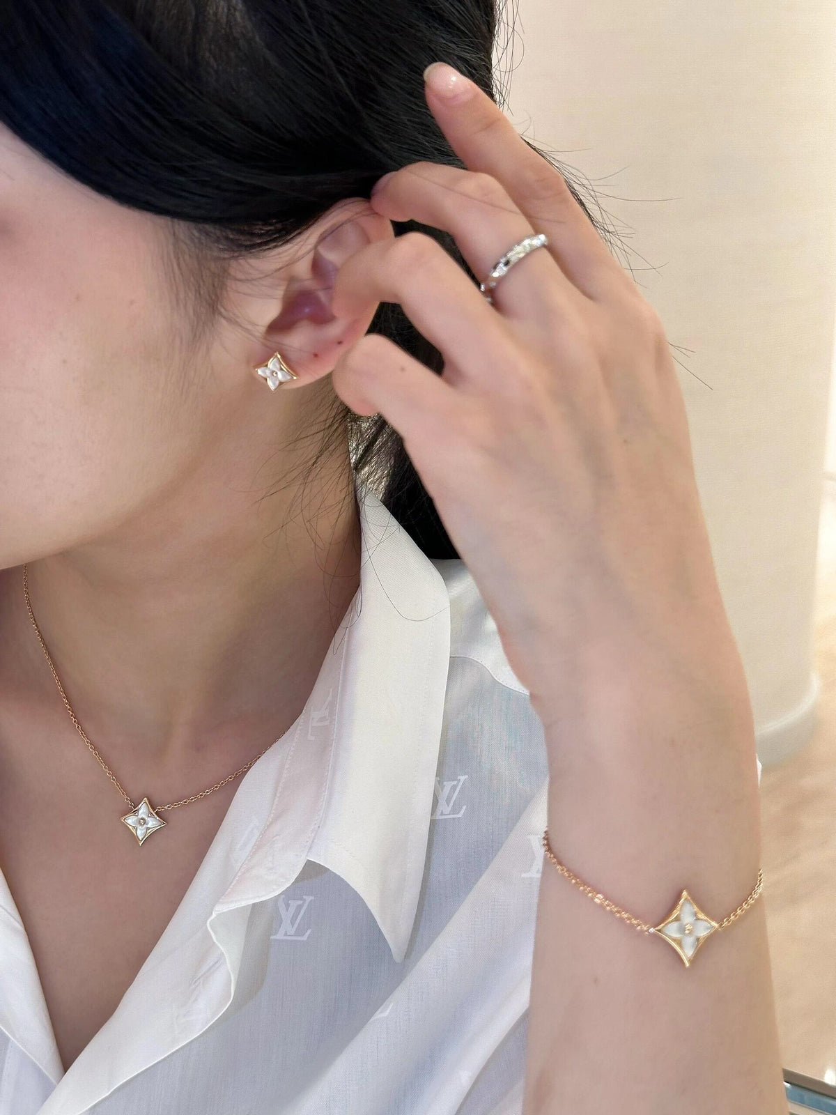 Geometric Emblem Pendant Necklace in Gold-Tone – White Detail styled product view
