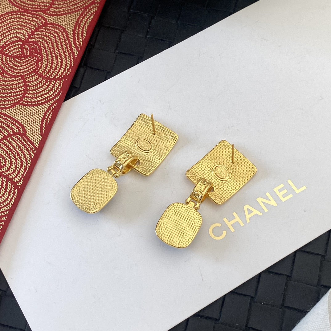 Letter Stud Earrings in Silver-Tone – Black Detail close-up detail