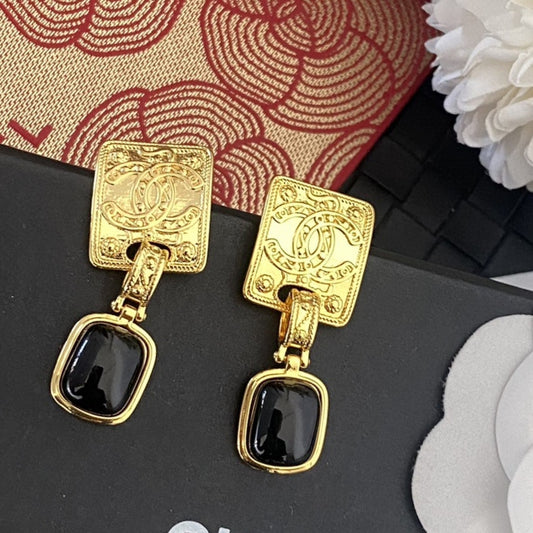 Letter Stud Earrings in Silver-Tone – Black Detail main product view