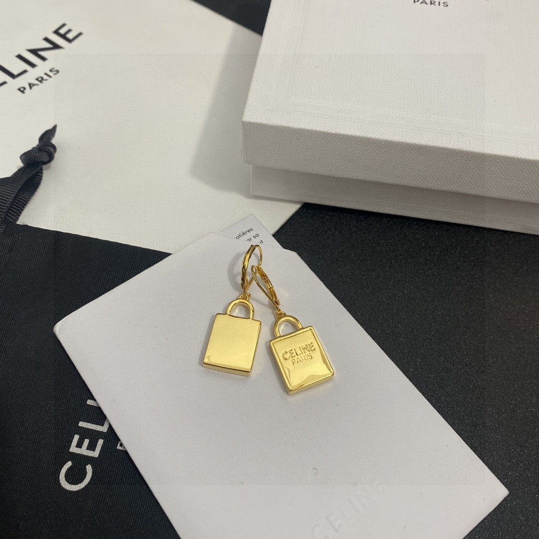 Signature Emblem Stud Earrings in Polished Metal-Tone – Design 01 close-up view