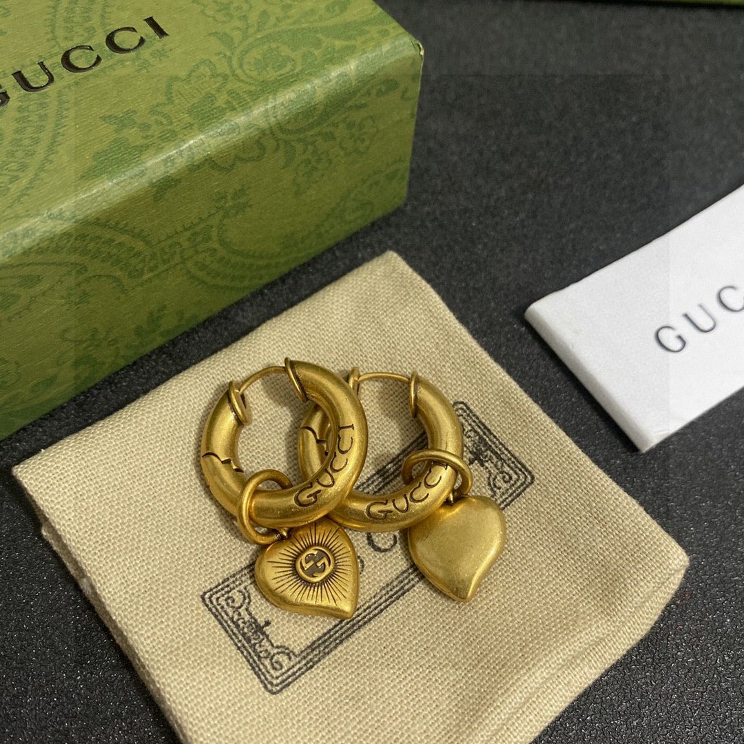 Letter Emblem Stud Earrings in Gold-Tone front product view