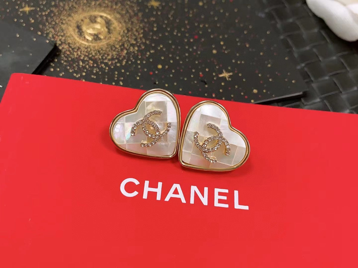 Double-C Emblem Stud Earrings in Polished Metal-Tone – Design 467 detail view