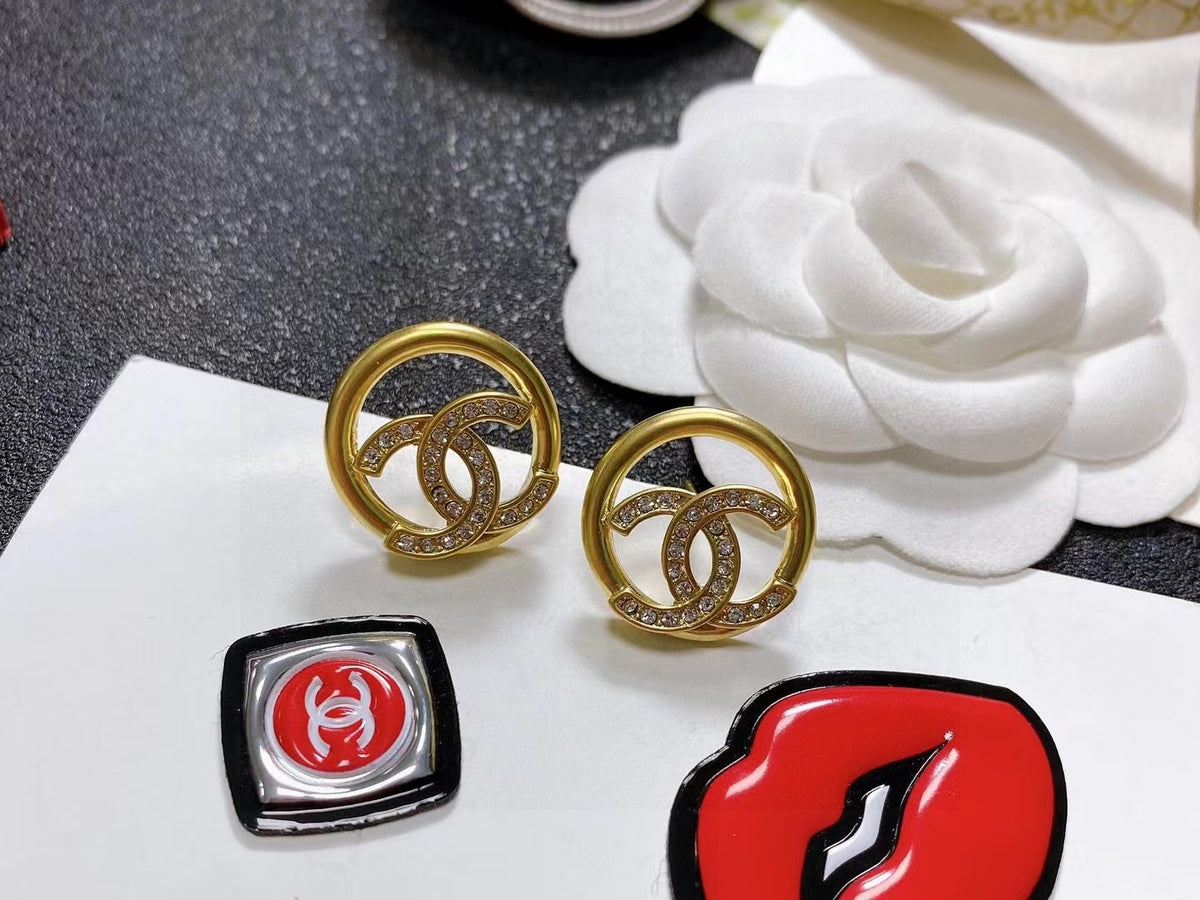 Double-C Emblem Stud Earrings in Polished Metal-Tone – Design 463 styled product view