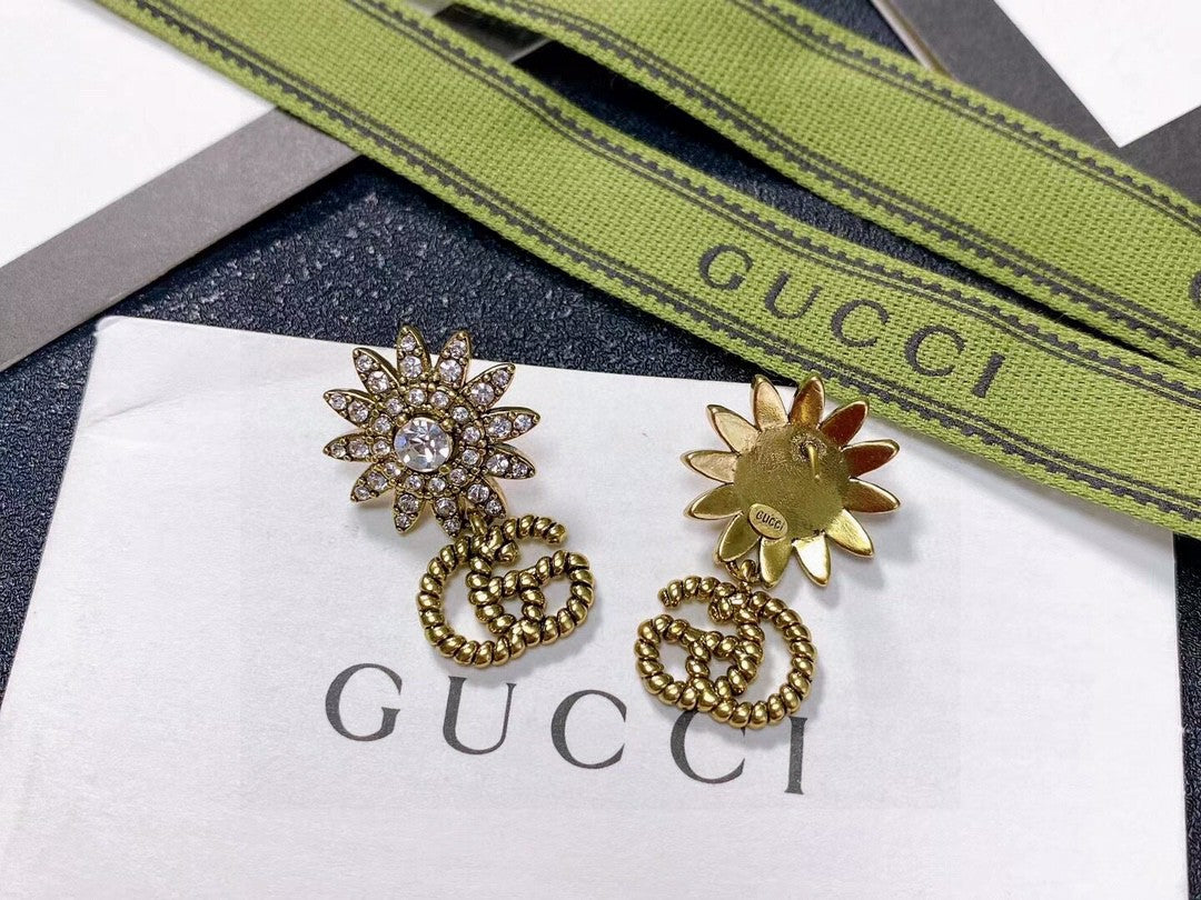 Double-G Emblem Stud Earrings in Silver-Tone – Design 006 detail view