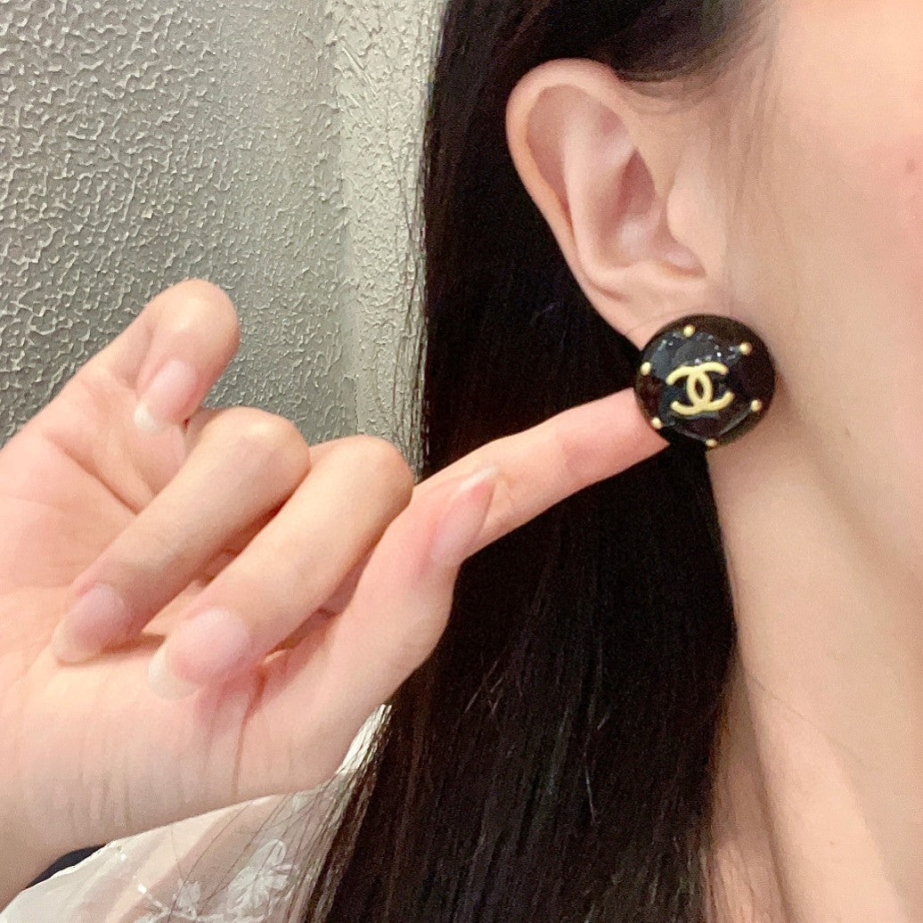 Double-C Emblem Stud Earrings in Polished Metal-Tone – Design 402 front product view