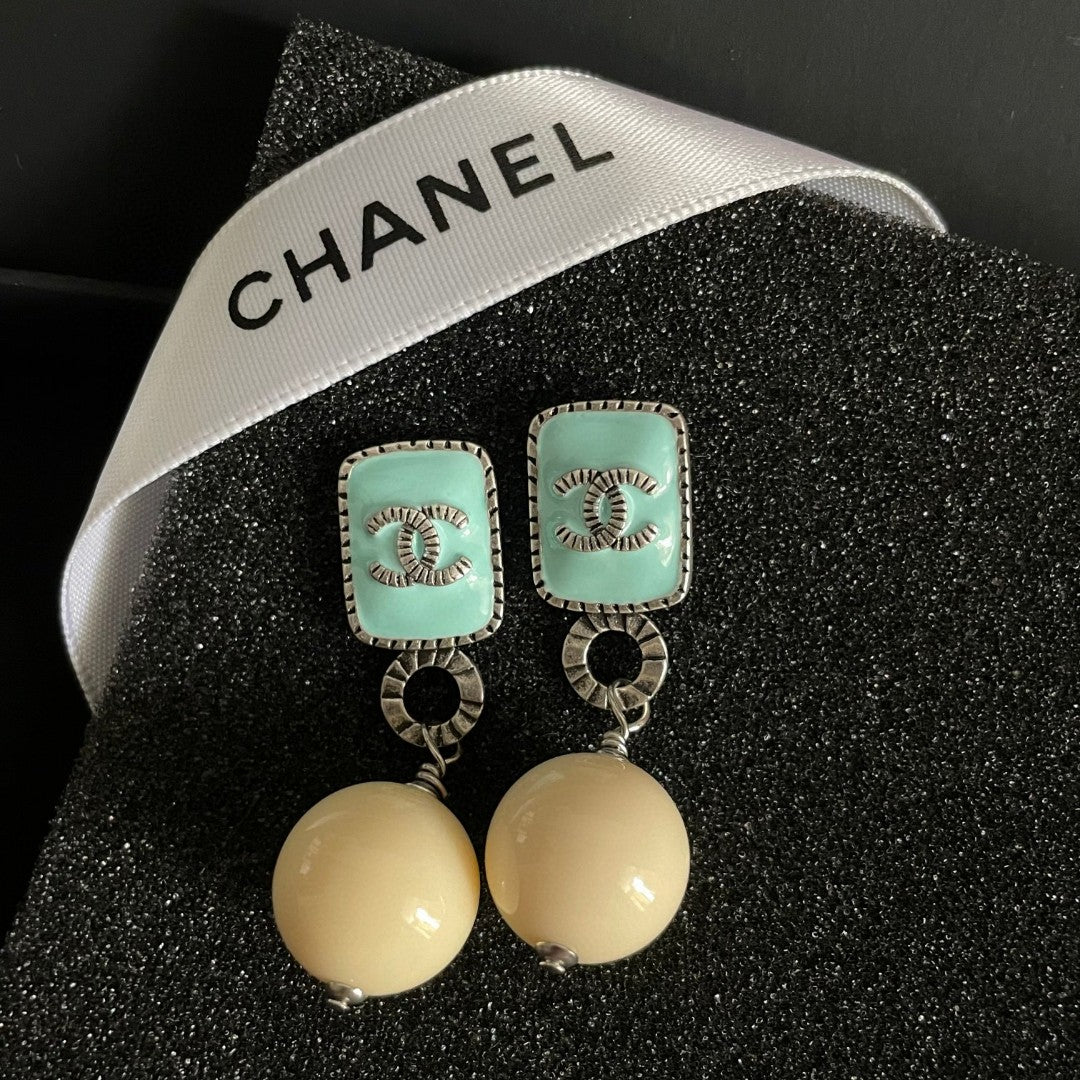 Double-C Emblem Pearl-Detail Statement Earrings – Pearl Detail – Design 030 styled product view