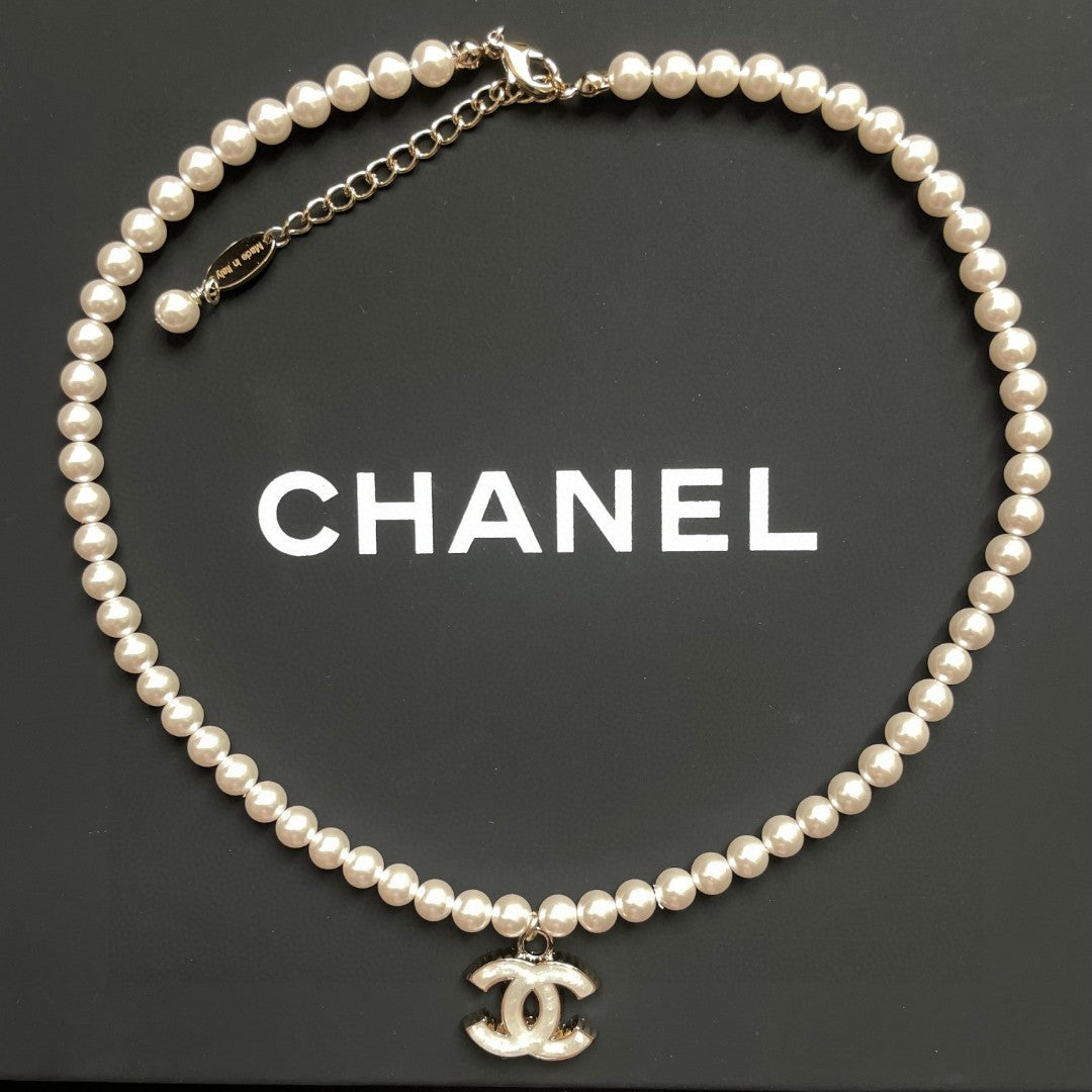 Double-C Emblem Pearl-Detail Pendant Necklace – Pearl Detail – Design 123 detail view