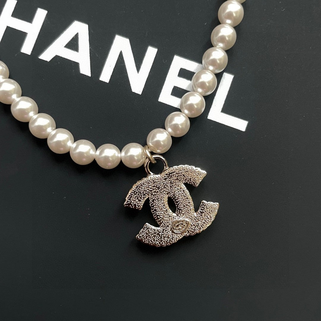 Double-C Emblem Pearl-Detail Pendant Necklace – Pearl Detail – Design 123 main product view