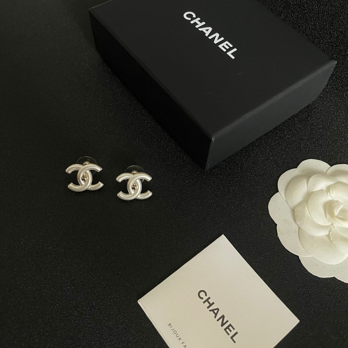 Double-C Emblem Stud Earrings in Polished Metal-Tone – Design 379 styled product view