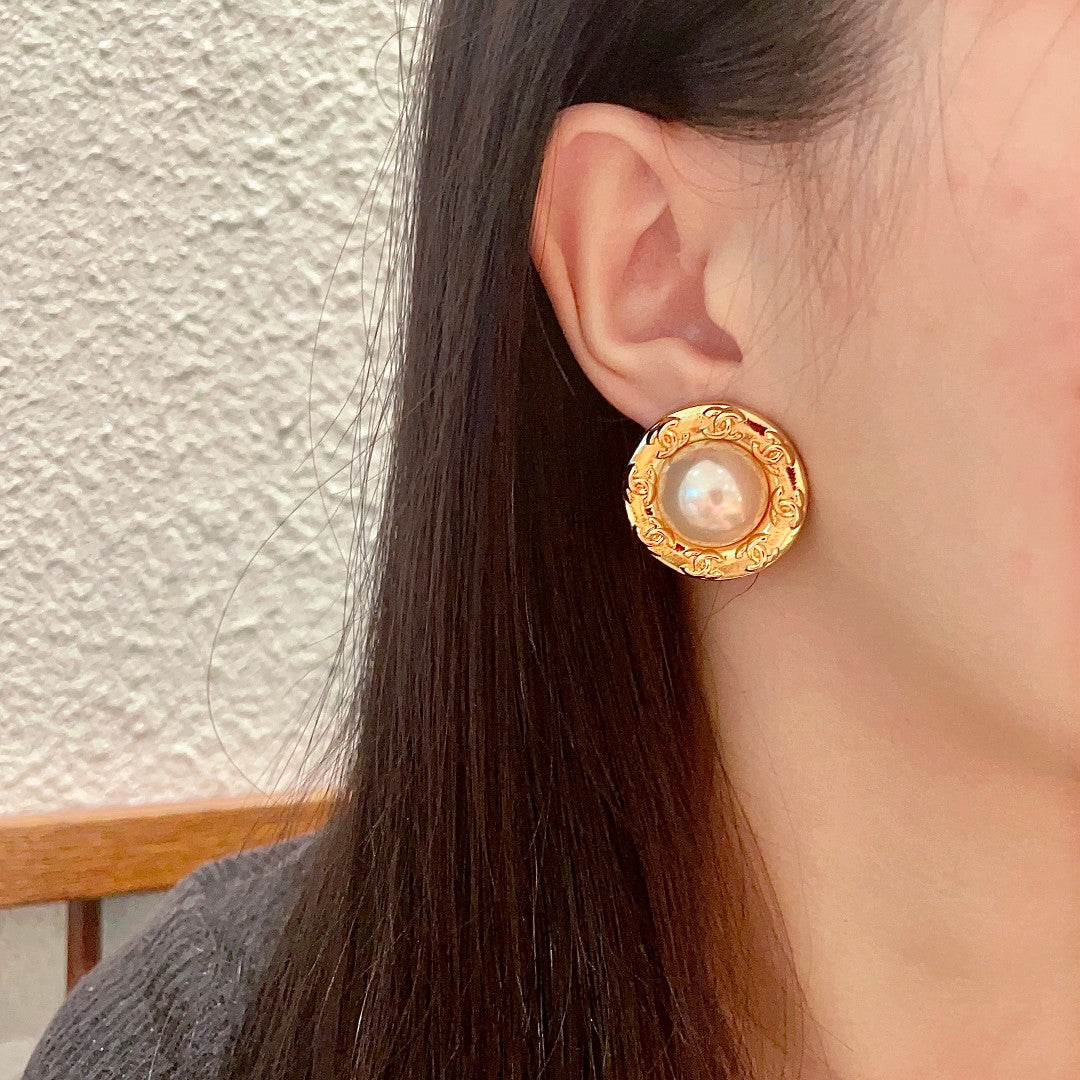 Double-C Emblem Pearl-Detail Stud Earrings – Pearl Detail – Design 025 detail view