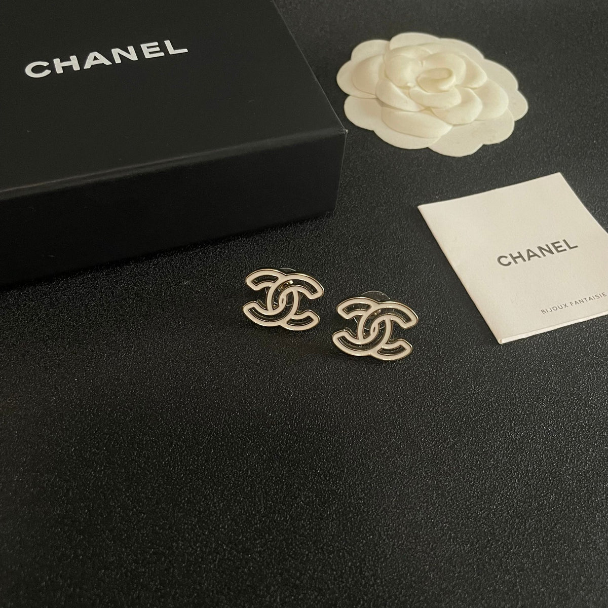 Double-C Emblem Stud Earrings in Polished Metal-Tone – Design 377 styled product view