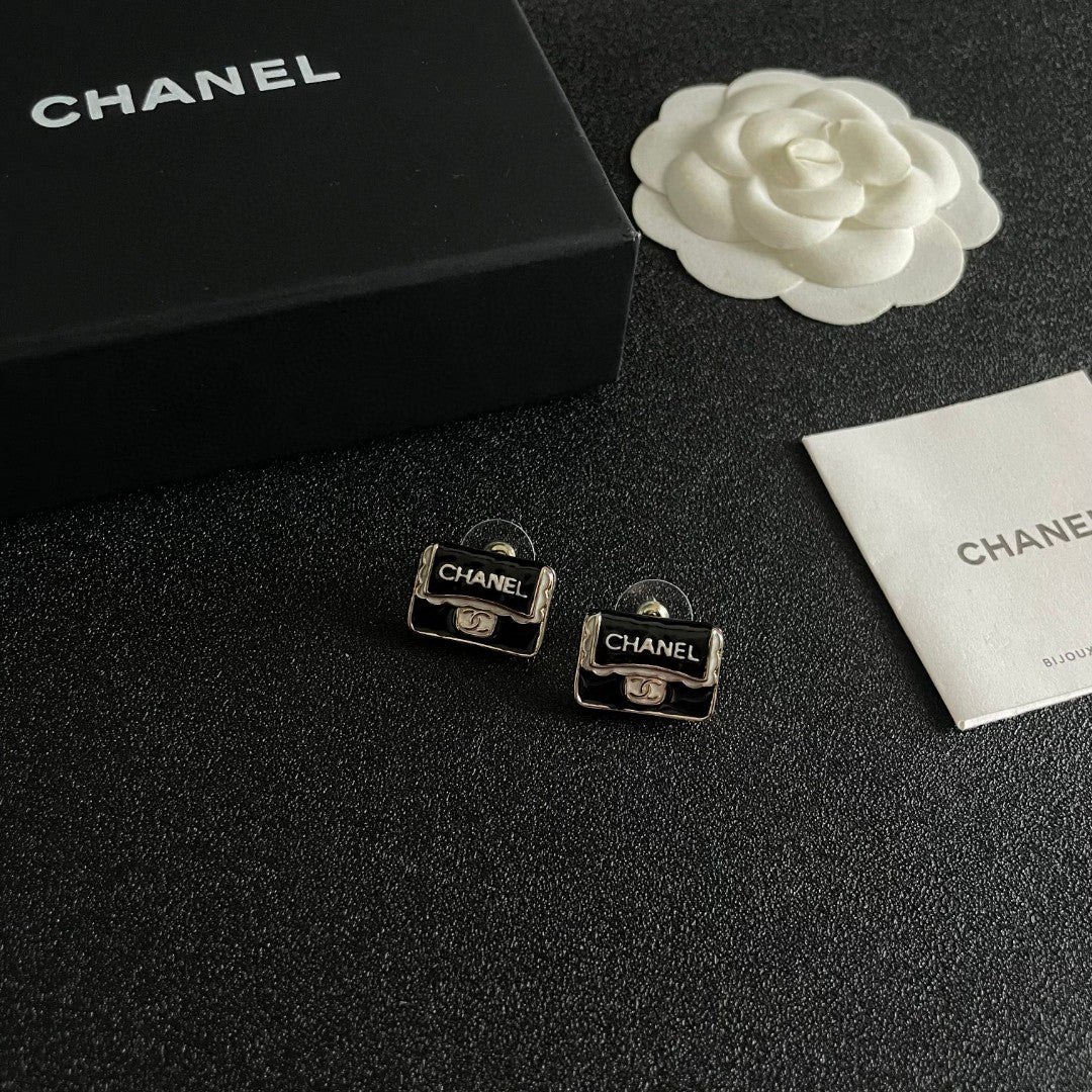 Double-C Emblem Stud Earrings in Polished Metal-Tone – Design 375 styled product view
