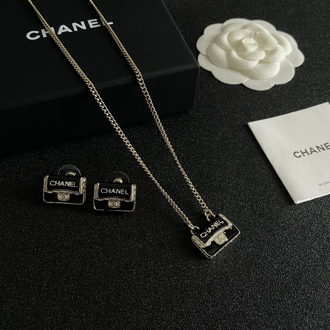Double-C Emblem Stud Earrings in Polished Metal-Tone – Design 375 side detail