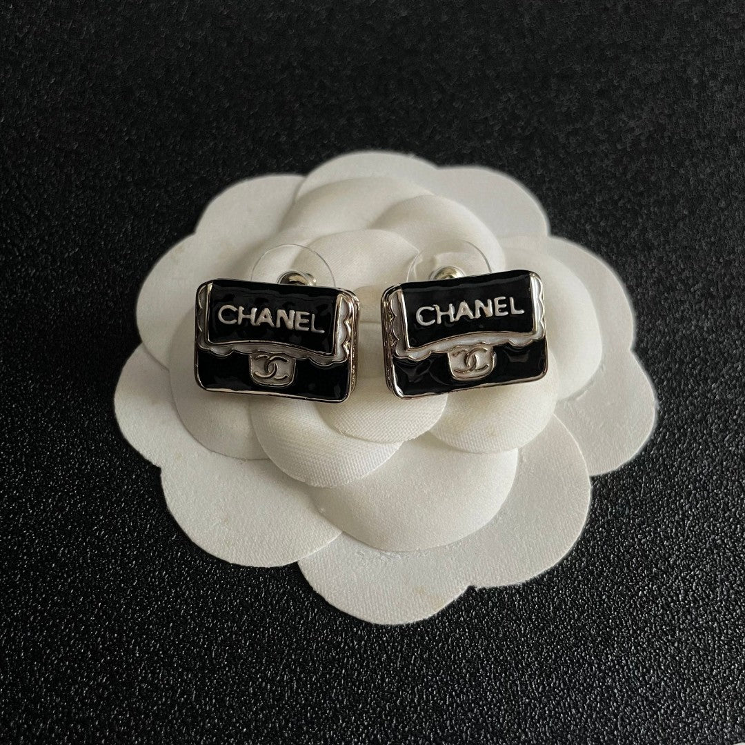 Double-C Emblem Stud Earrings in Polished Metal-Tone – Design 375 front product view