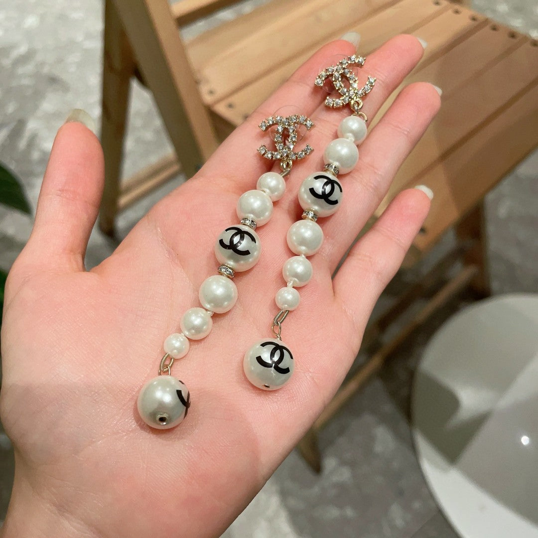 Double-C Emblem Pearl-Detail Statement Earrings – Pearl Detail – Design 028 side detail
