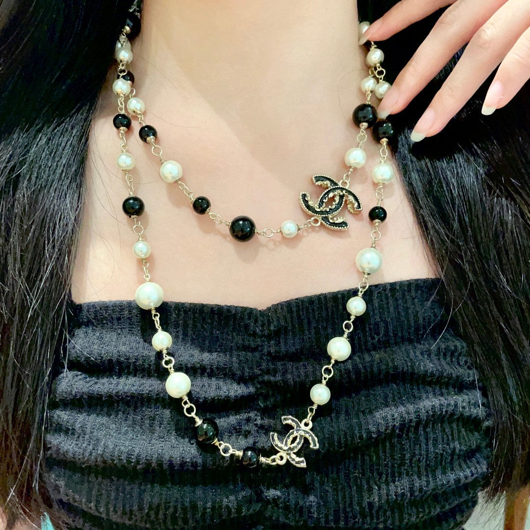 Double-C Emblem Pearl-Detail Pendant Necklace – Pearl Detail – Design 117 detail view