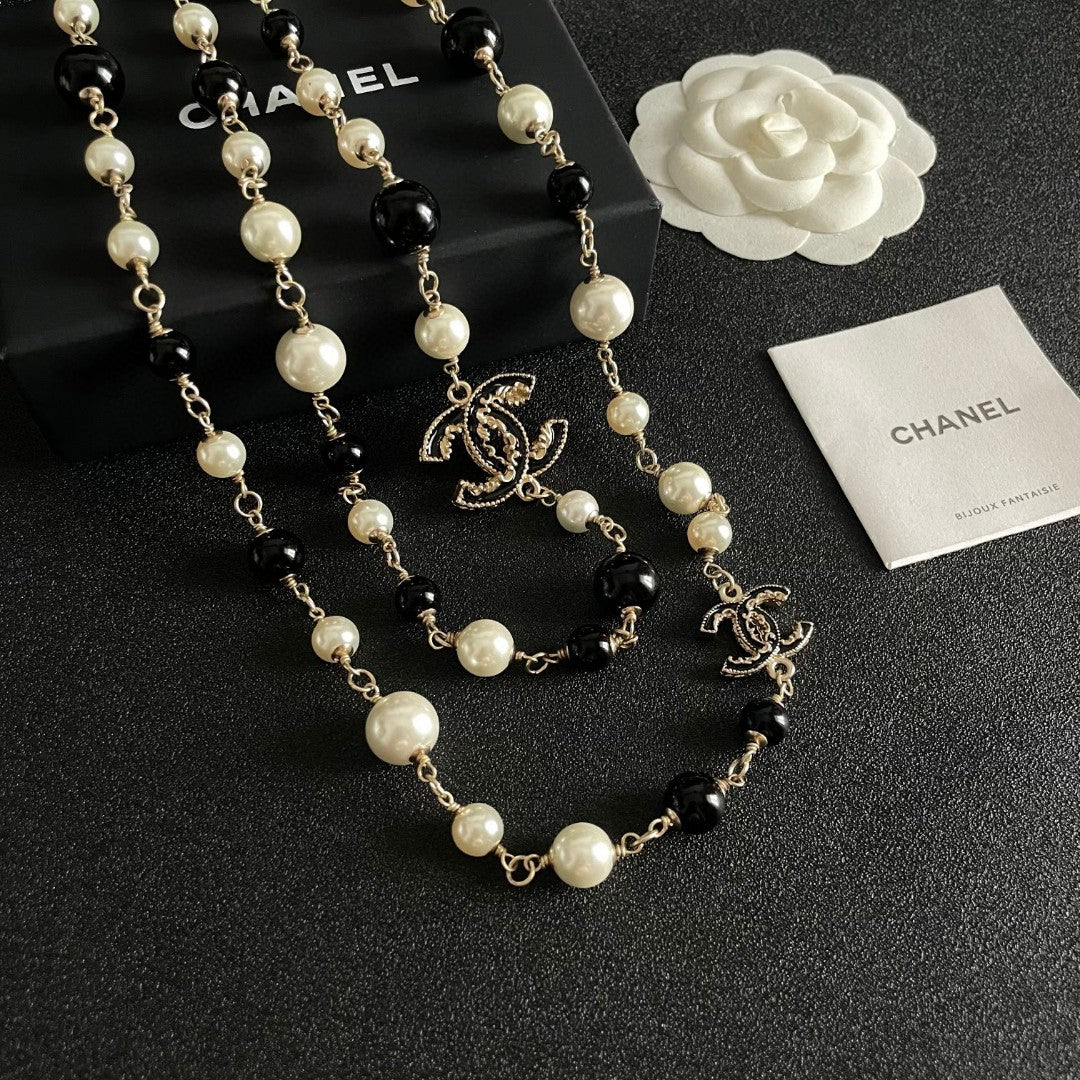 Double-C Emblem Pearl-Detail Pendant Necklace – Pearl Detail – Design 117 styled product view