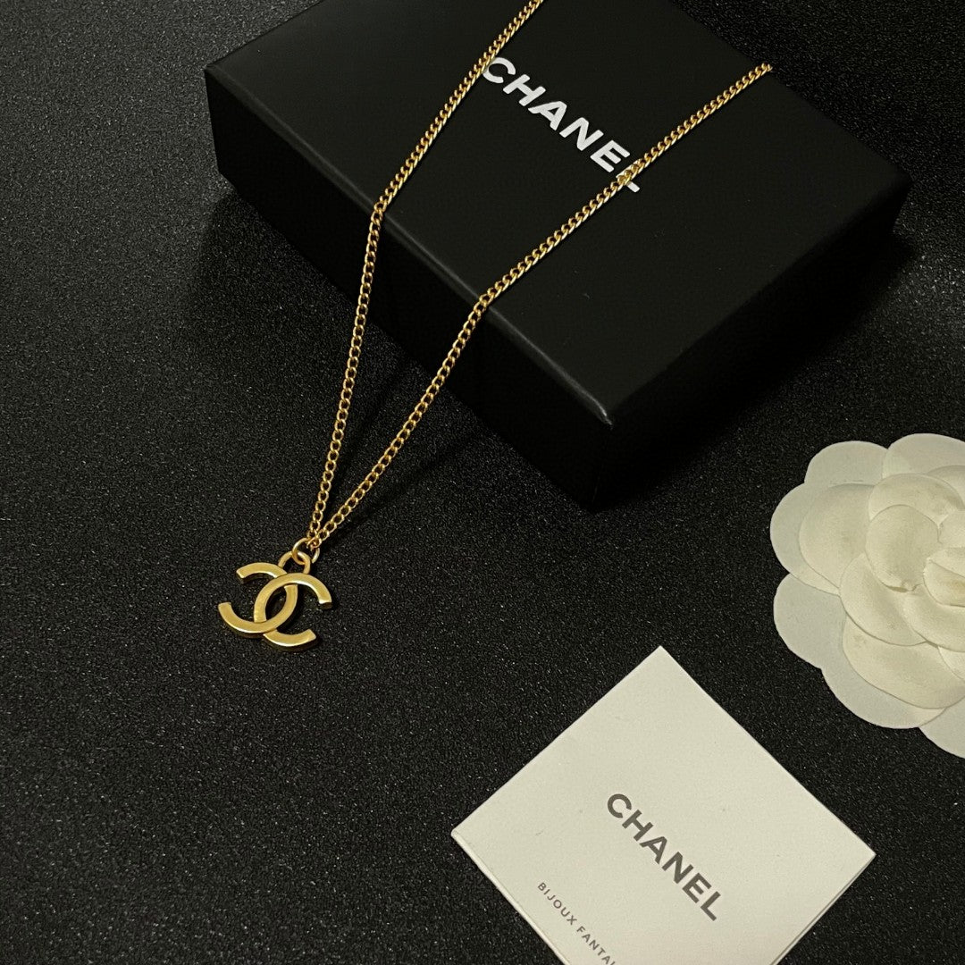 Double-C Emblem Pendant Necklace in Polished Metal-Tone – Design 072 styled product view