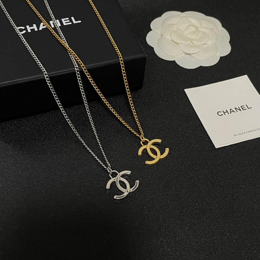 Double-C Emblem Pendant Necklace in Polished Metal-Tone – Design 072 close-up detail