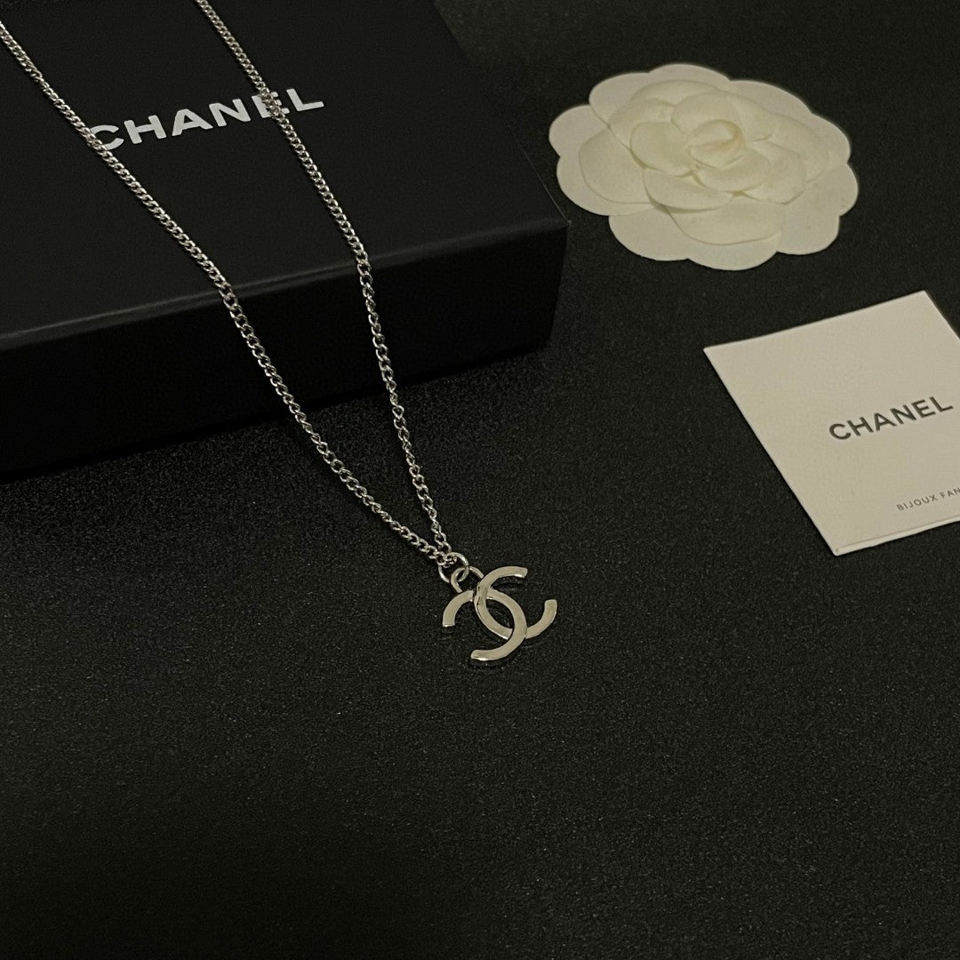 Double-C Emblem Pendant Necklace in Polished Metal-Tone – Design 071 styled product view