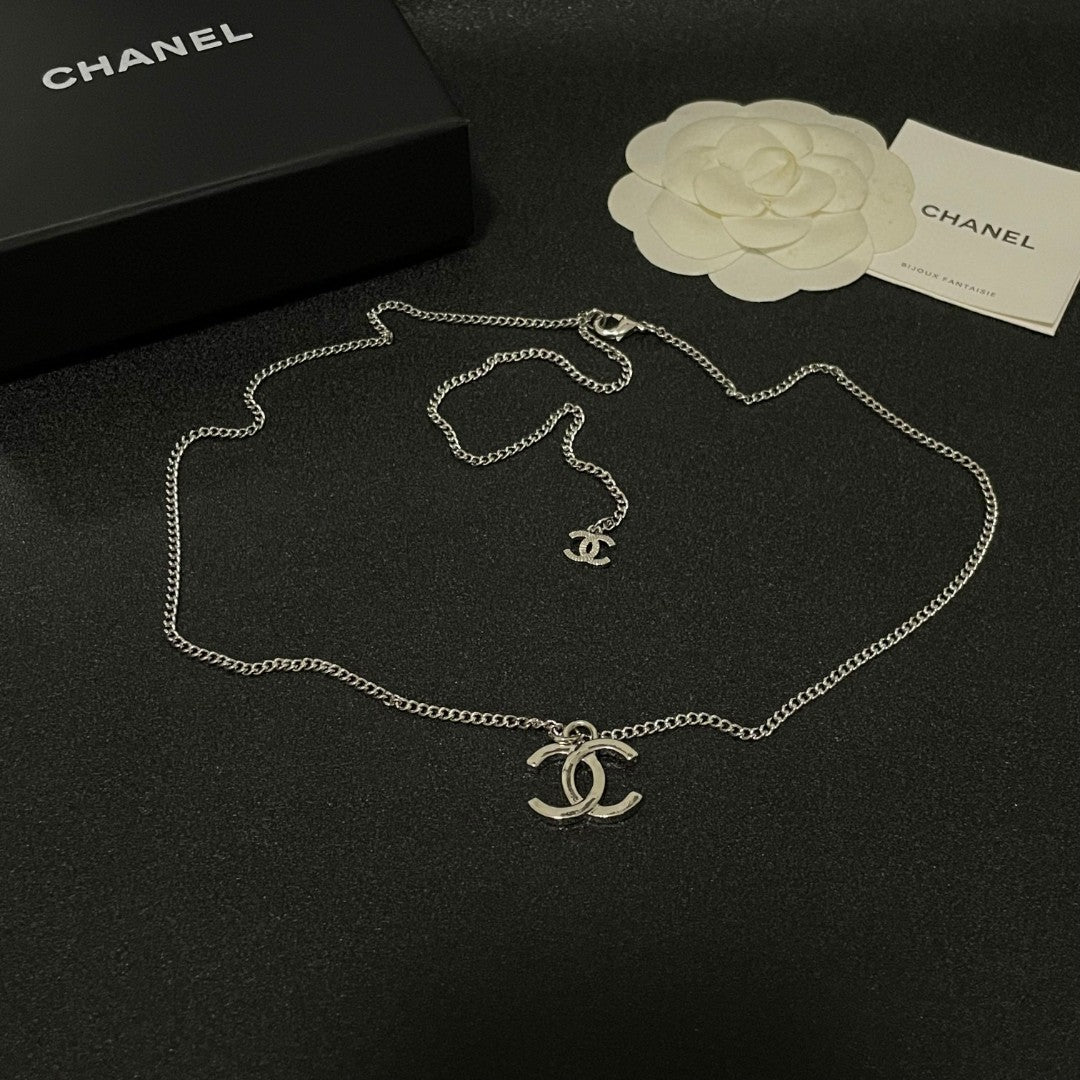 Double-C Emblem Pendant Necklace in Polished Metal-Tone – Design 071 detail view
