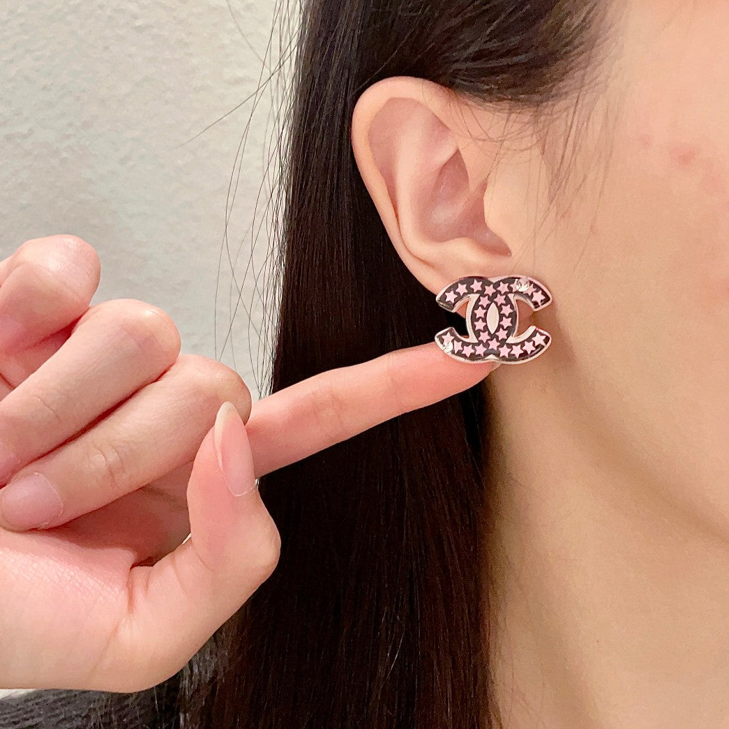 Double-C Emblem Stud Earrings in Polished Metal-Tone – Star Detail – Design 019 front product view