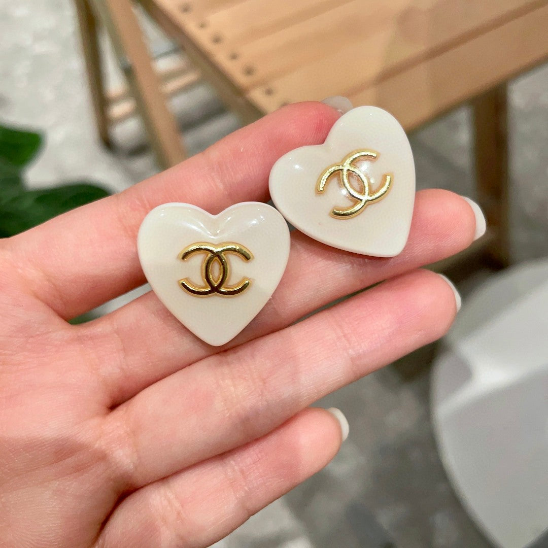 Double-C Emblem Stud Earrings in Polished Metal-Tone – Heart Detail – Design 015 side detail
