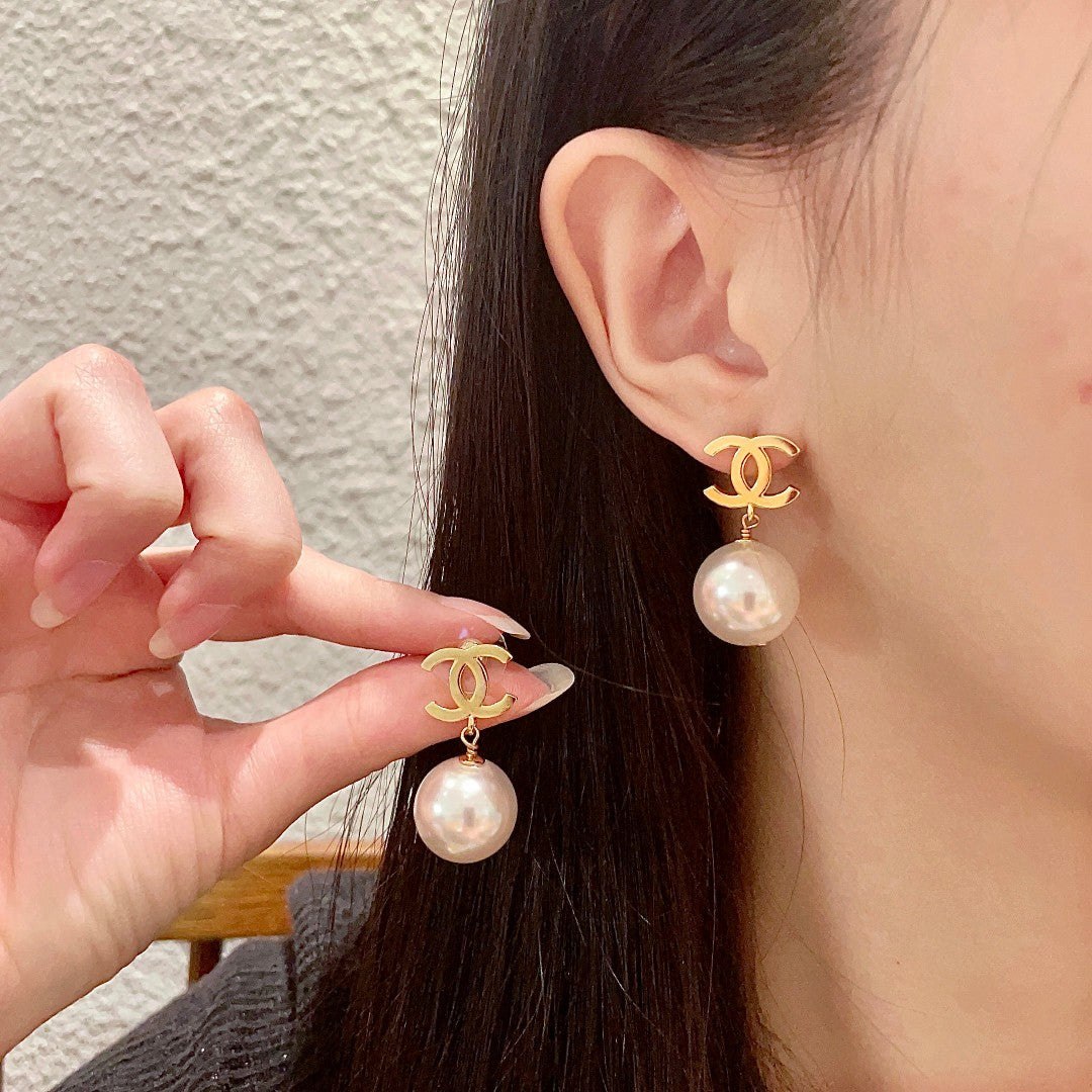 Double-C Emblem Pearl-Detail Stud Earrings – Pearl Detail – Design 024 main product view