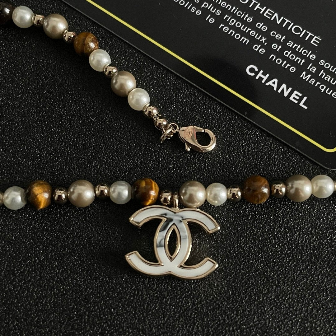 Double-C Emblem Pearl-Detail Pendant Necklace – Pearl Detail – Design 109 styled product view
