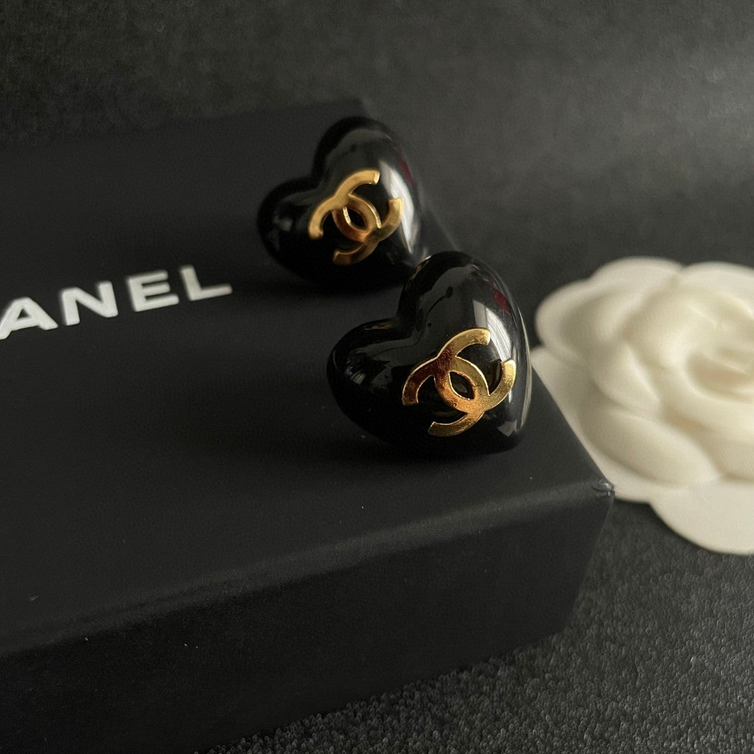 Double-C Emblem Stud Earrings in Polished Metal-Tone – Heart Detail – Design 014 detail view