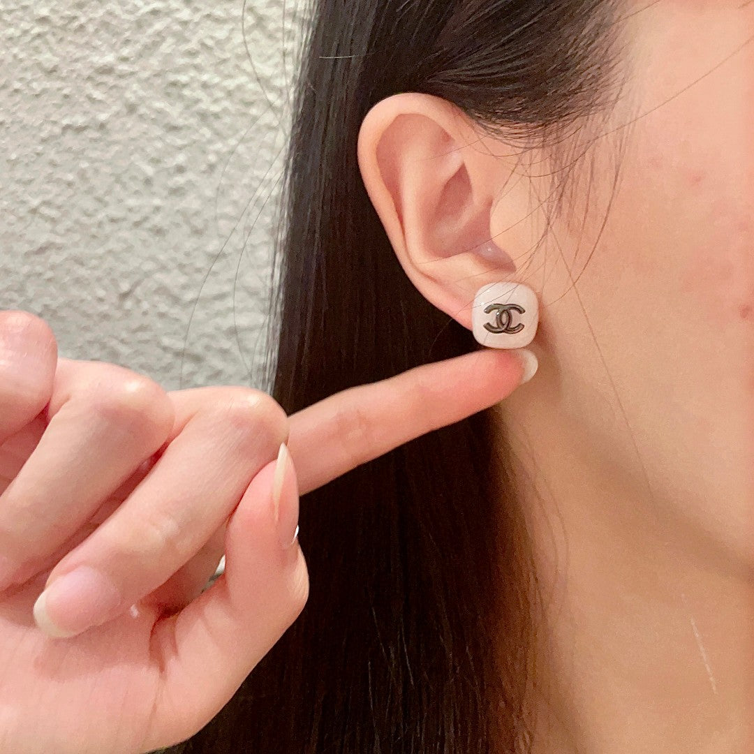 Double-C Emblem Stud Earrings in Polished Metal-Tone – Design 364 front product view
