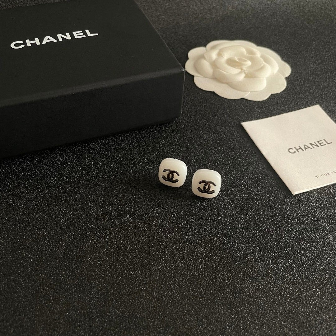 Double-C Emblem Stud Earrings in Polished Metal-Tone – Design 364 styled product view