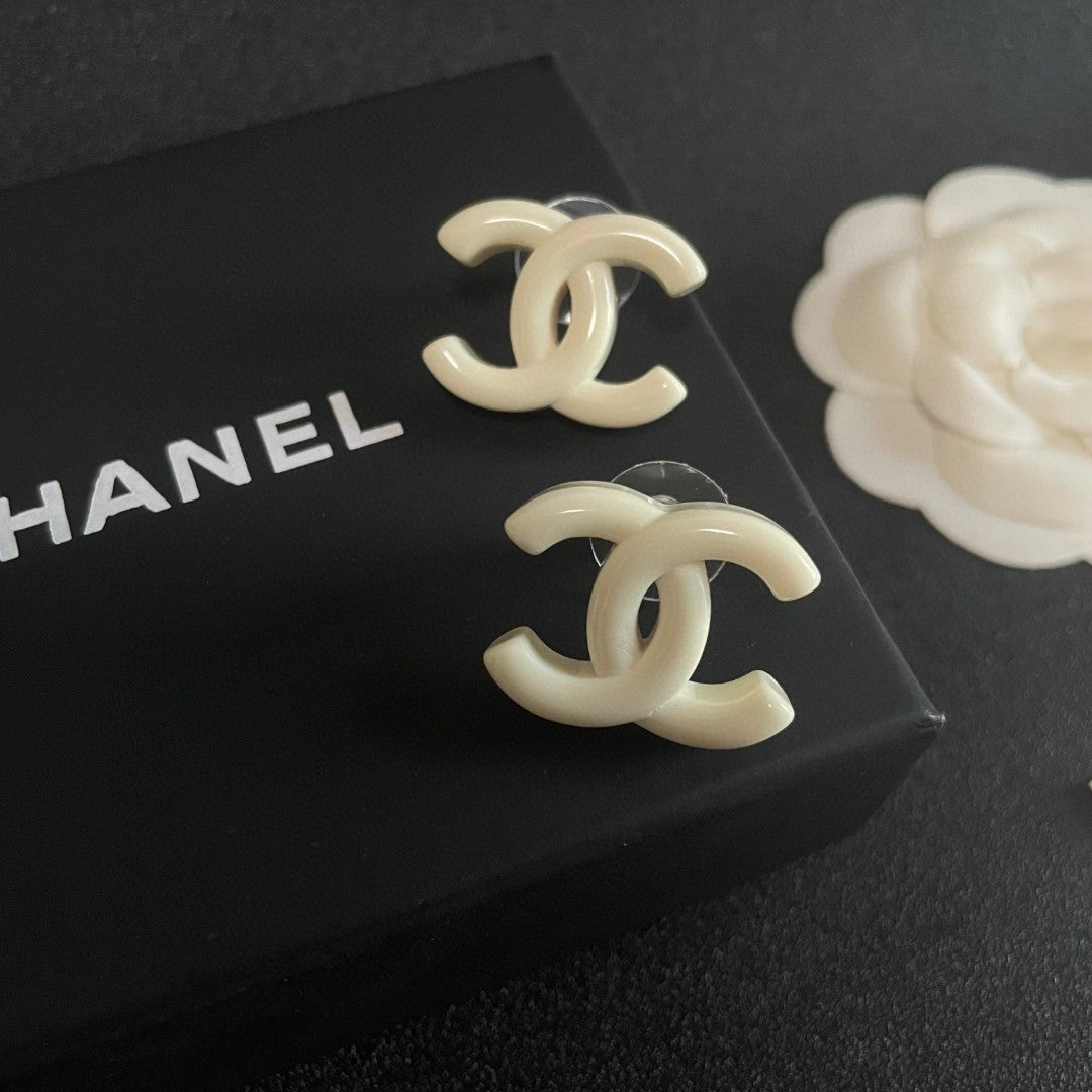 Double-C Emblem Stud Earrings in Polished Metal-Tone – Design 363 detail view