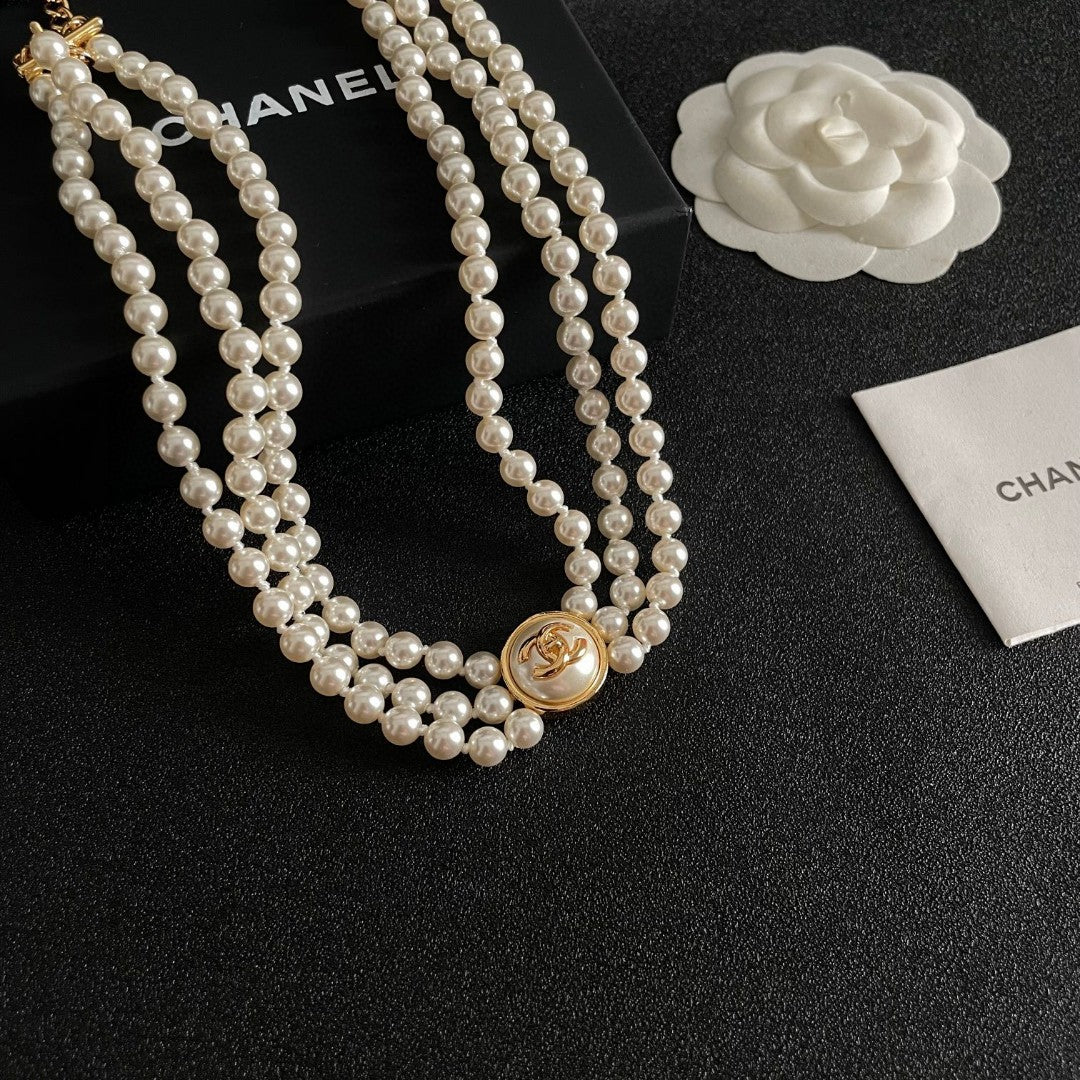 Double-C Emblem Pearl-Detail Pendant Necklace – Pearl Detail – Design 107 styled product view