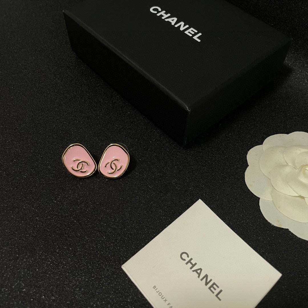 Double-C Emblem Stud Earrings in Polished Metal-Tone – Design 360 close-up detail