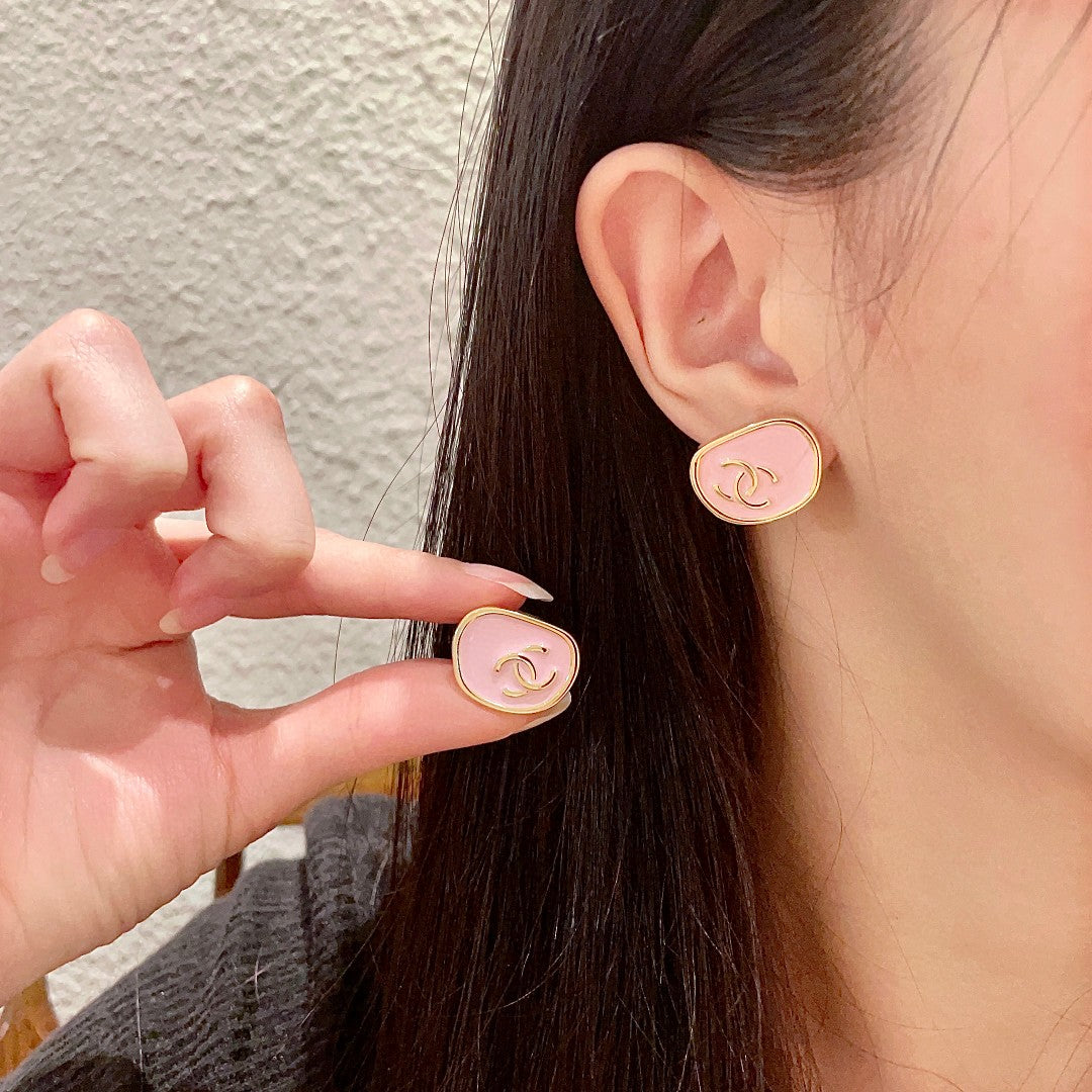 Double-C Emblem Stud Earrings in Polished Metal-Tone – Design 360 main product view