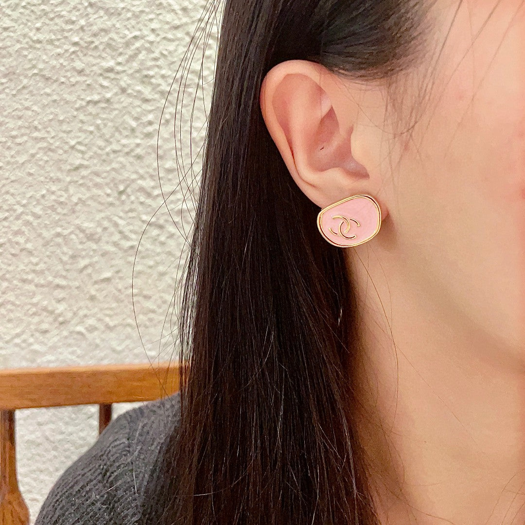 Double-C Emblem Stud Earrings in Polished Metal-Tone – Design 360 detail view