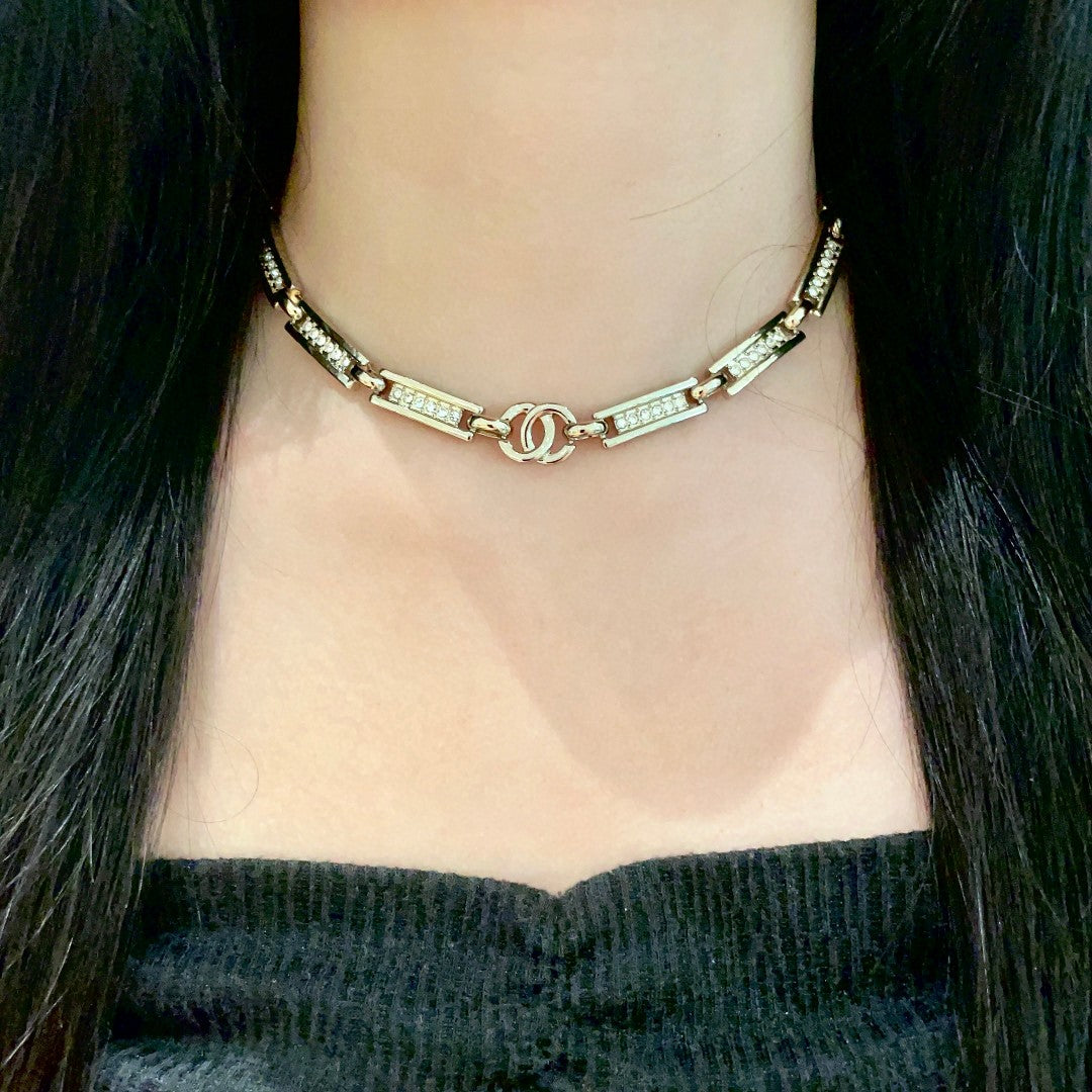 Double-C Emblem Pendant Necklace in Polished Metal-Tone – Design 059 detail view